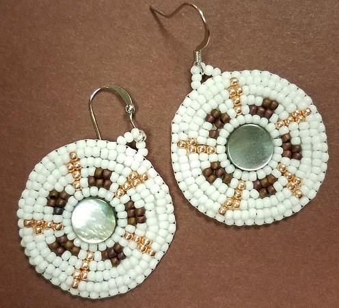 White beaded circular earrings